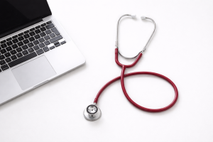 Modern Medical Laptop and Stethoscope Wallpaper, Professional Healthcare Background for Desktop and Mobile
