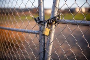 Secure Metal Fence with Padlock - Minimalist Gate Lock Wallpaper for Desktop and Mobile