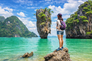 Beautiful Traveler Enjoying Stunning Thai Island View with Crystal Clear Ocean Water 4K Desktop Background