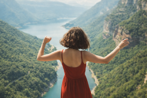 Beautiful Woman with Arms Outstretched Over Mountain Valley 4K Desktop Background