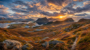 Golden Sunset Over Mountain Landscape